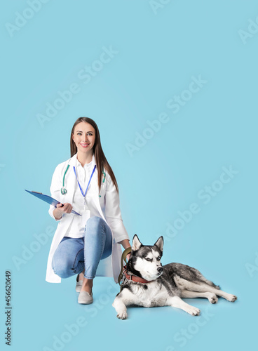Veterinarian with cute dog ...