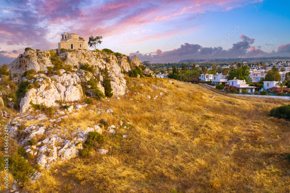 Cyprus view from a quadcopter. Landscape of city of Protaras. Church of Prophet Elijah on a stone hill. Excursions to Prophet Elijah. Protaras drone view. Holidays in Republic of Cyprus.