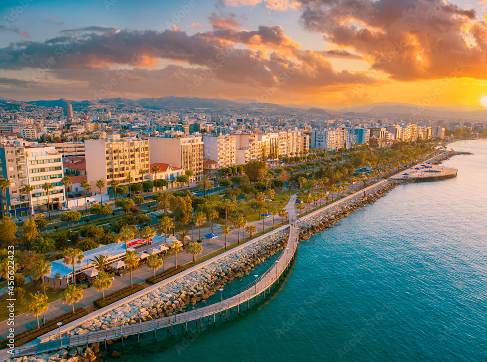 Republic of Cyprus. Limassol city at sunset. Embankment of island of Cyprus. Limassol embankment top view. Rest in Limassoll. City on shores of the Mediterranean Sea. Trip to Cyprus. - obrazy, fototapety, plakaty 