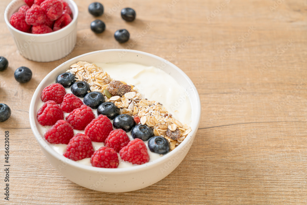 homemade yogurt bowl with raspberry, blueberry and granola homemade yogurt bowl with raspberry, blueberry and granola