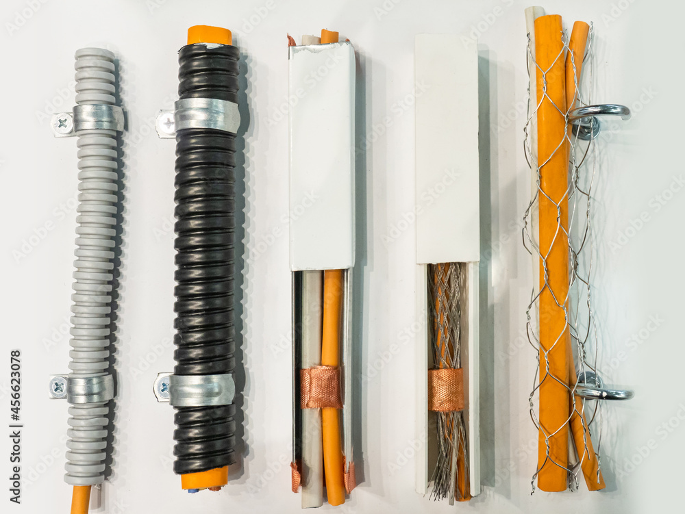 Types of electrical wiring. Pieces of electrical wires on white background. Demonstration of