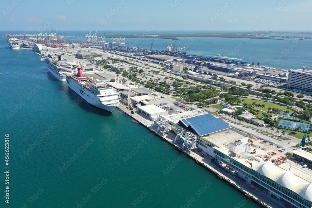 Aerial view of cruise ships docked at Port Miami, Florida on sunny clear summer afternoon.