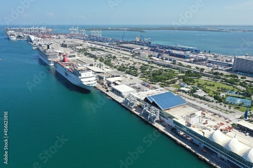 Aerial view of cruise ships docked at Port Miami, Florida on sunny clear summer afternoon.