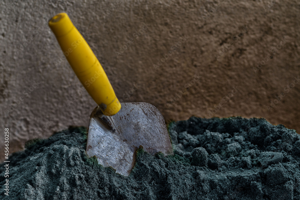 trowel working with sand and cement trowel working with sand and cement
