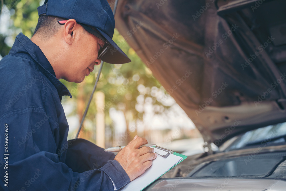 Mechanic car service auto garage in automotive mobile center. Technician workshop repair engine motor vehicles service mechanical engineering business. Automobile mechanic hands car repairs technic Mechanic car service auto garage in automotive mobile center. Technician workshop repair engine motor vehicles service mechanical engineering business. Automobile mechanic hands car repairs technic