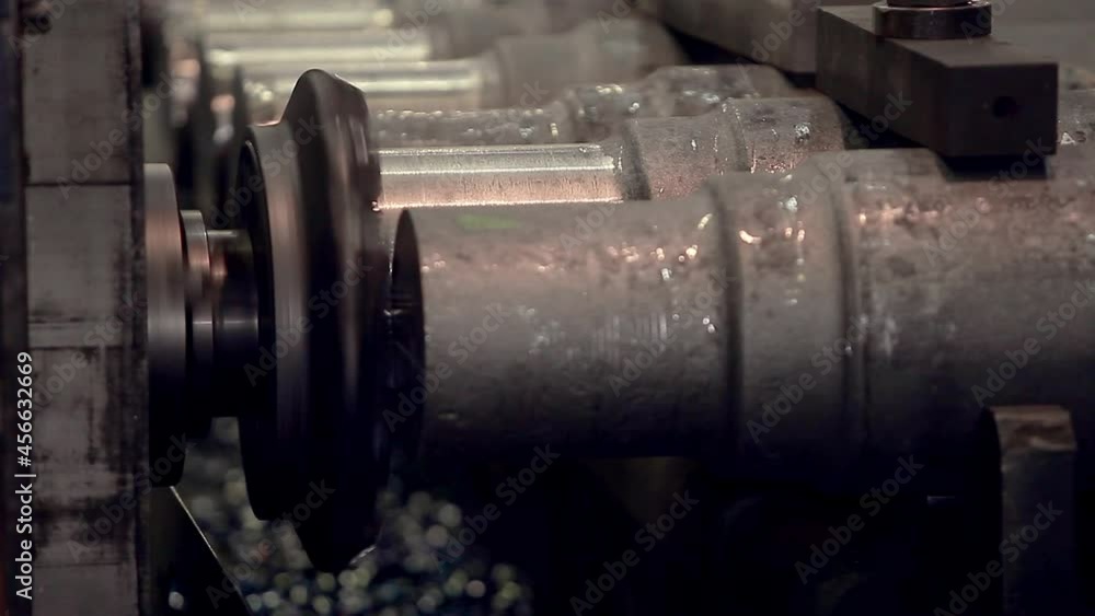 Close-up of a section of steel pipes stacked on top of each other. conveyor production of iron products Close-up of a section of steel pipes stacked on top of each other. conveyor production of iron products