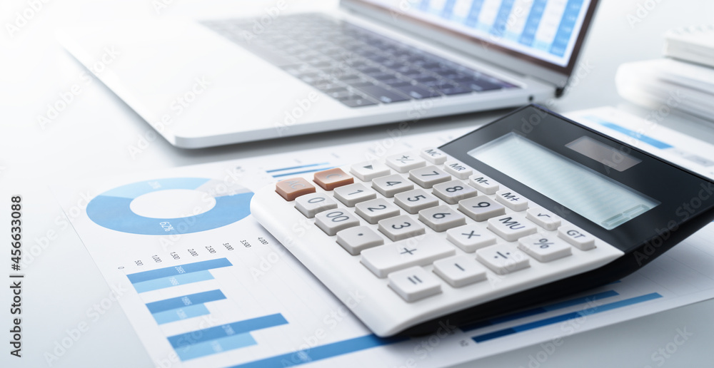 Business accounting. Calculator, report and laptop. Business accounting. Calculator, report and laptop.