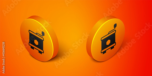 Isometric Honey extractor icon isolated on orange background. Mechanical device for honey extraction from honeycombs. Orange circle button. Vector