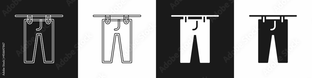 Set Drying clothes icon isolated on black and white background. Clean pants. Wash clothes on a rope with clothespins. Clothing care and tidiness. Vector Set Drying clothes icon isolated on black and white background. Clean pants. Wash clothes on a rope with clothespins. Clothing care and tidiness. Vector