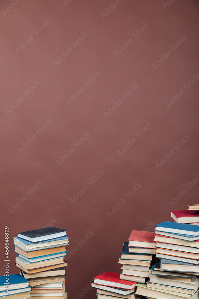 Stacks of books for teaching knowledge university library brown background Stacks of books for teaching knowledge university library brown background
