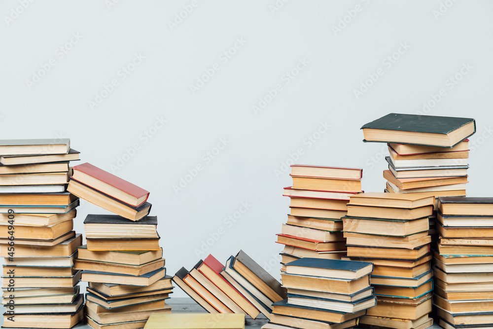 Stacks of books for teaching knowledge library university school white background Stacks of books for teaching knowledge library university school white background