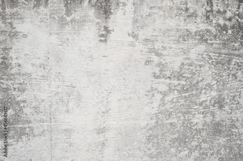 Old white cement wall texture background. Grunge concrete wall backdrop with plaster.  © sallies