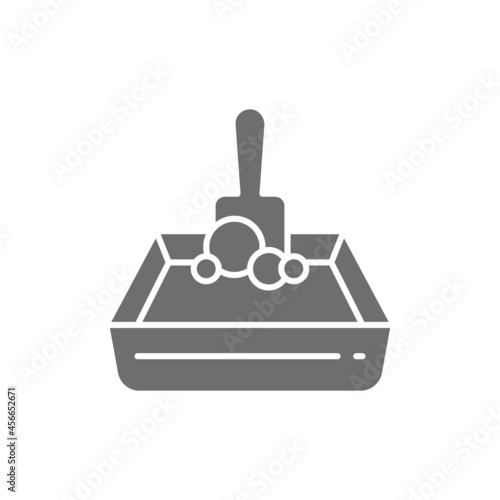 Vector sand tray and shovel grey icon.