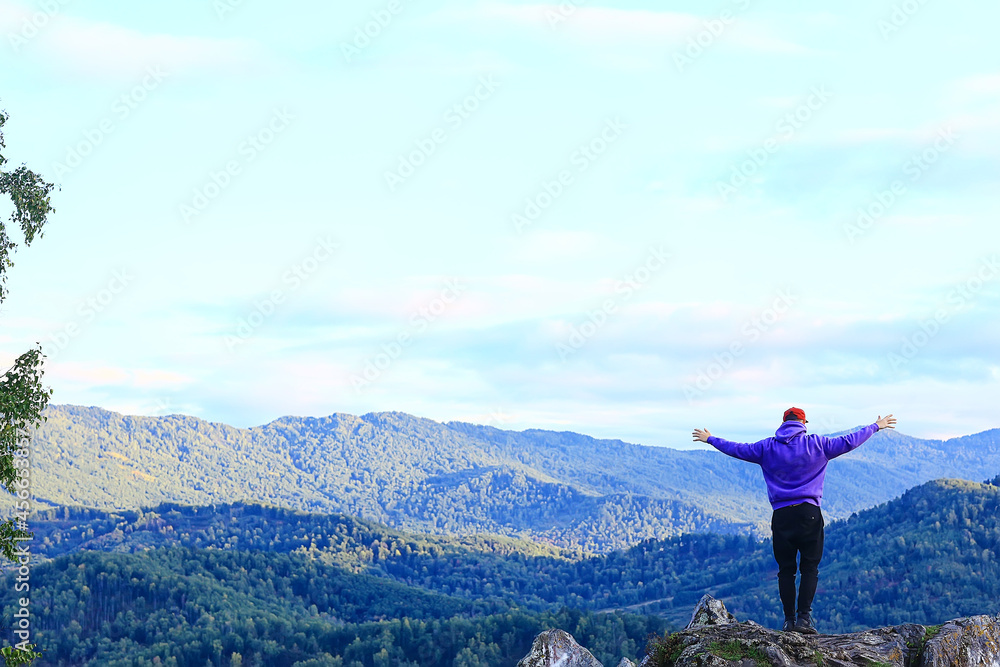 mountain man raised his hands, concept freedom victory active adventure mountain man raised his hands, concept freedom victory active adventure