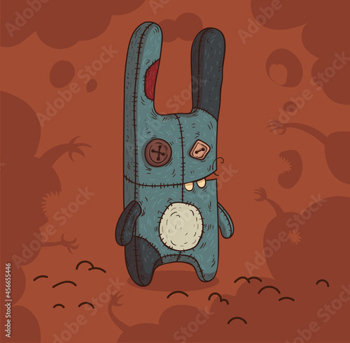 Funny handmade voodoo rabbit against a background of monster shadows