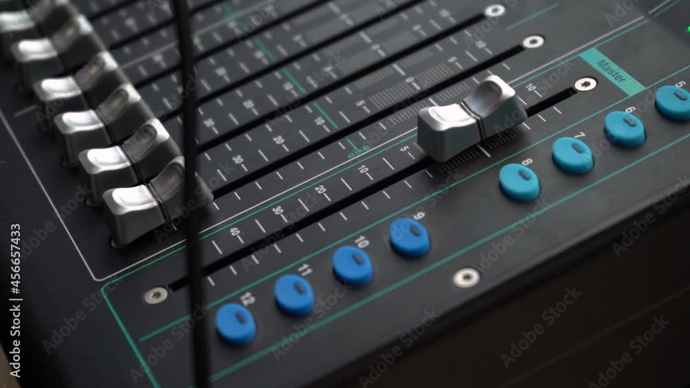 Close Up Of Channel Faders And Buttons Of A Digital Audio Mixer. Close Up Of Channel Faders And Buttons Of A Digital Audio Mixer.