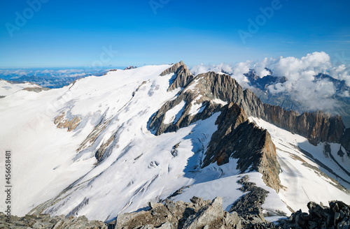 Wild alpine landscape with snow, glaciers and rocky mountains at a sunny day in the Uri Alps. Switzerland, Europe