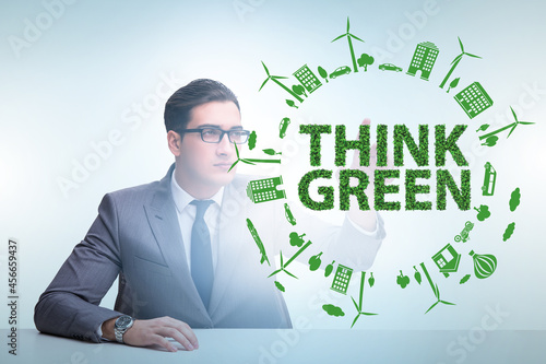 Think green ecological concept with businessman