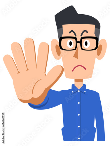 手で制止するメガネをかけて青いシャツを着た男性
