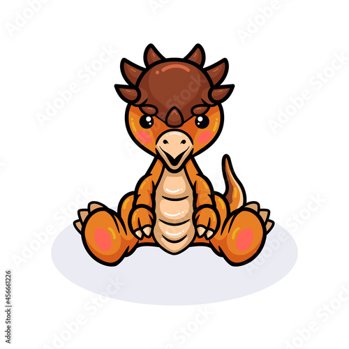 Cute little pachycephalosaurus dinosaur cartoon sitting