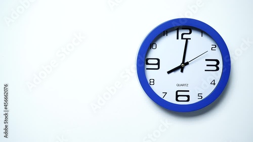 Wallpaper Mural Blue wall clock ticking showing eight hours. 8 o'clock. Time deadline concept. Timelapse. Torontodigital.ca