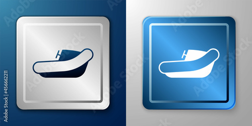White Inflatable boat with outboard motor icon isolated on blue and grey background. Silver and blue square button. Vector