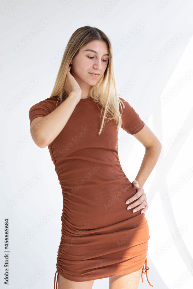White girl with blonde hair in dress isolated on white White girl with blonde hair in dress isolated on white