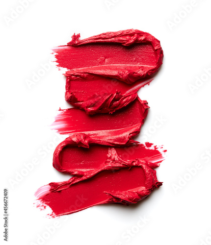 Set of red lipstick smears isolated on white background