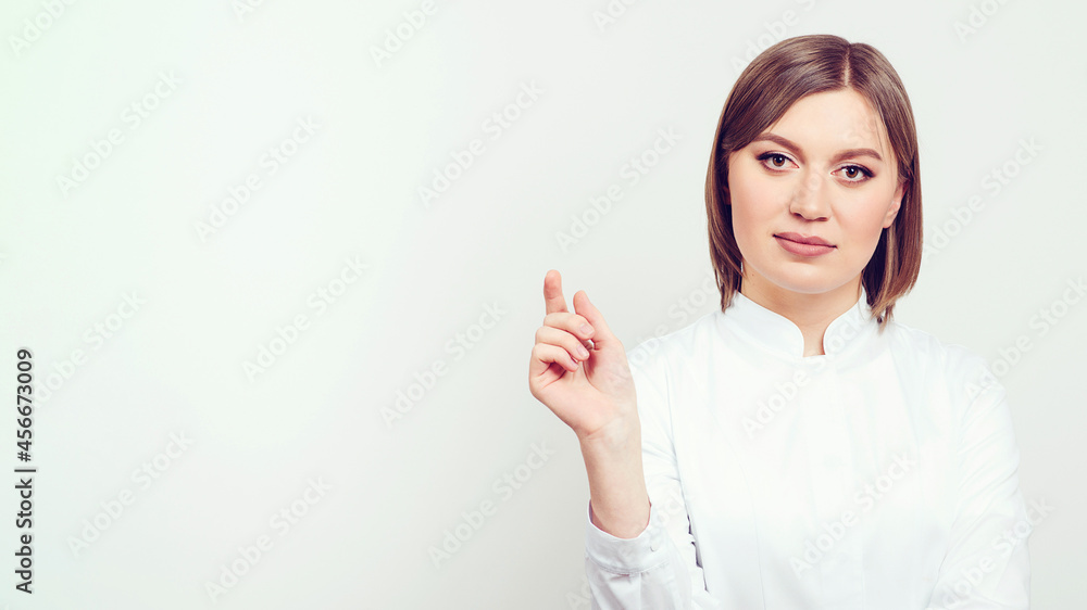 Attractive female doctor in white lab coat. Therapy treatment remedy cure concept. Hospital staff worker. Attractive female doctor in white lab coat. Therapy treatment remedy cure concept. Hospital staff worker.