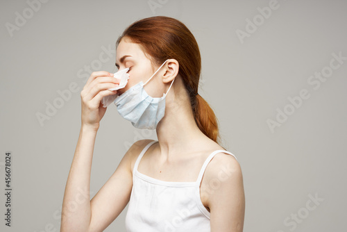 woman in white t-shirt with a scarf isolated background