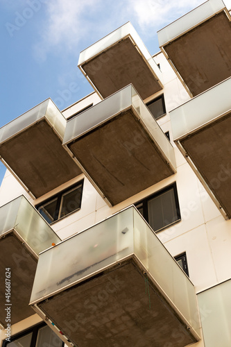 Fototapeta Vertical low angle shot of a residential building in Vita Bjorn, Majorna, Gothen