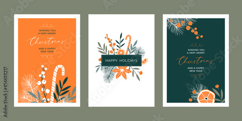 Set of Christmas greeting card templates with floral elements and handwritten calligraphy. Trendy vintage style. 