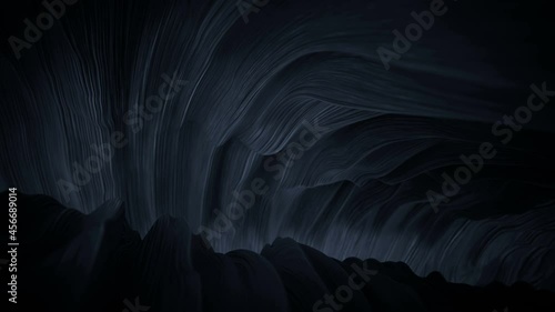 Black abstract wavy shape. 3D render seamless loop animation photo