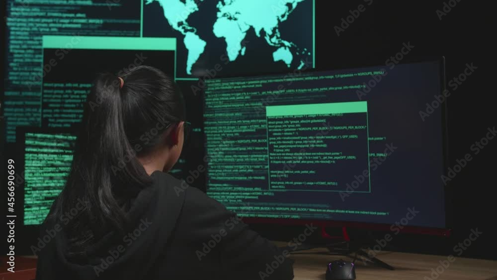 Asian Young Girl Hacker Hacking With Multiple Computer Screens In Dark Room
Asian Young Girl Hacker Hacking With Multiple Computer Screens In Dark Room