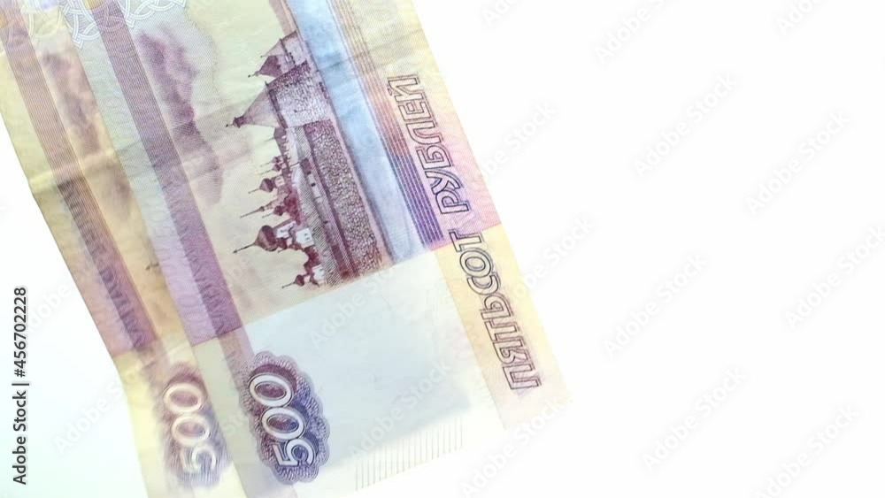paper banknotes of the Russian Federation, money Russian rubles falling on the table from above, scattering, slow motion, the concept of banking operations, devaluation paper banknotes of the Russian Federation, money Russian rubles falling on the table from above, scattering, slow motion, the concept of banking operations, devaluation