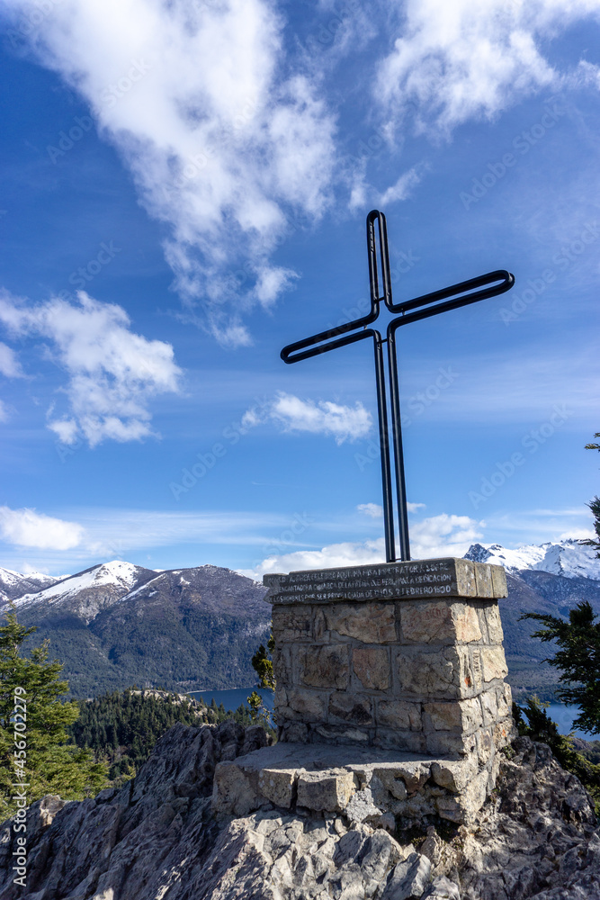 Cross in the mountains in sunny weather