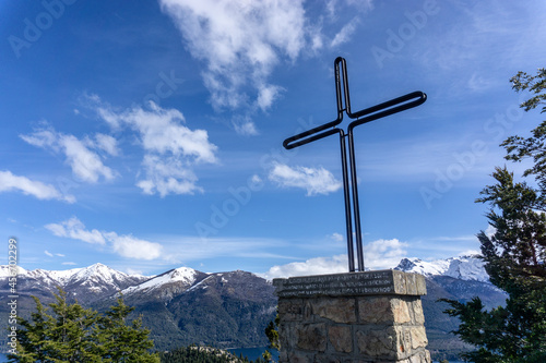 Cross in the mountains in sunny weather