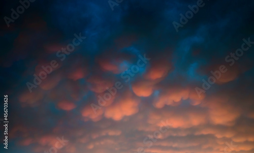 amazing cloudscape of stormy weather with dramatic mammatus clouds