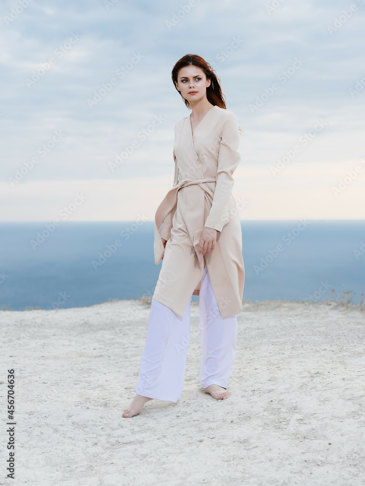 beautiful woman in coat posing beach fresh air elegant style beautiful woman in coat posing beach fresh air elegant style