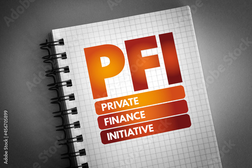 PFI - Private Finance Initiative acronym on notepad, business concept background photo