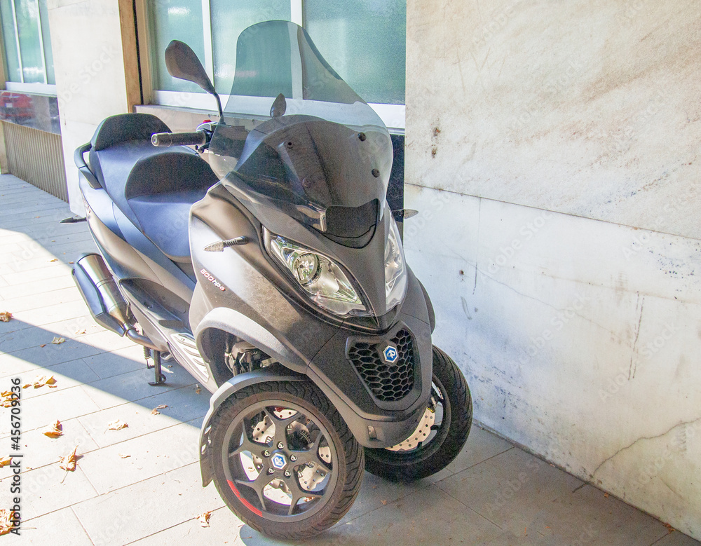 Three-wheeled scooter for the city, Piaggio Mp3 500 Hpe Sport Advanced  Stock Photo | Adobe Stock