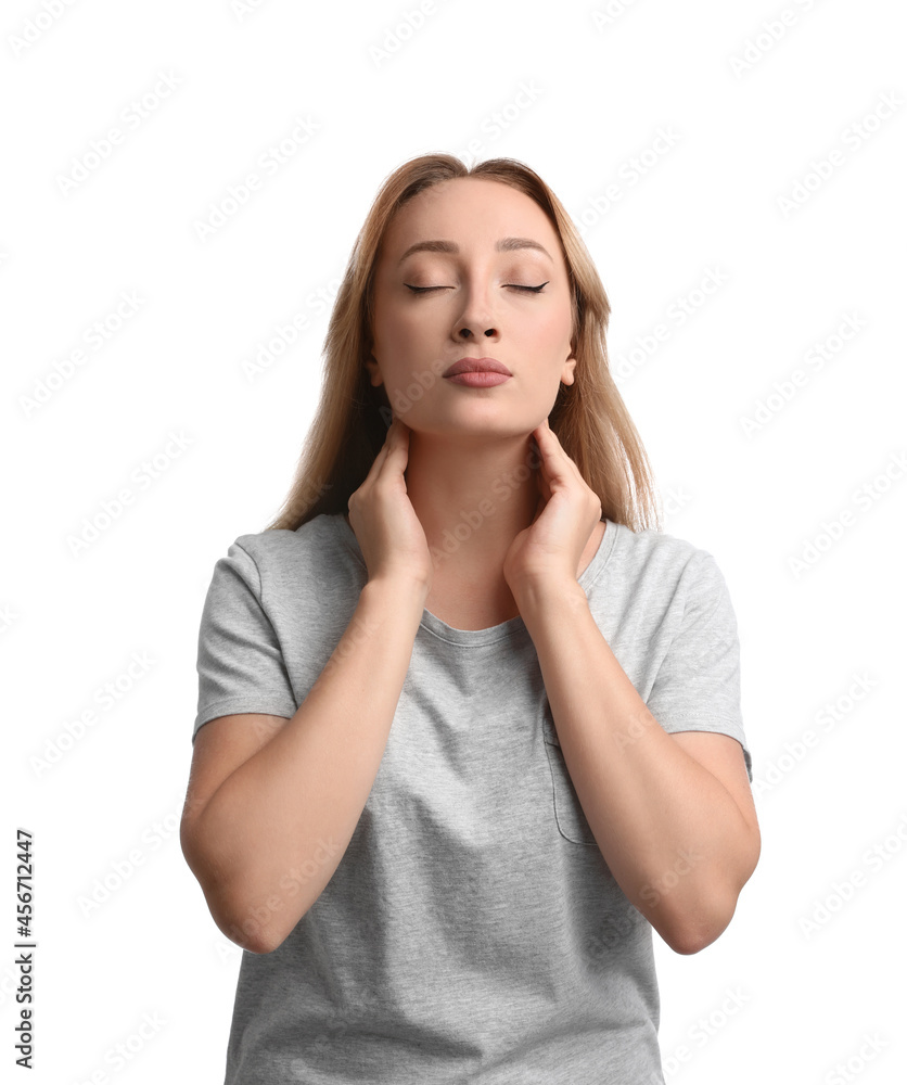 Young woman doing thyroid self examination on white background Young woman doing thyroid self examination on white background