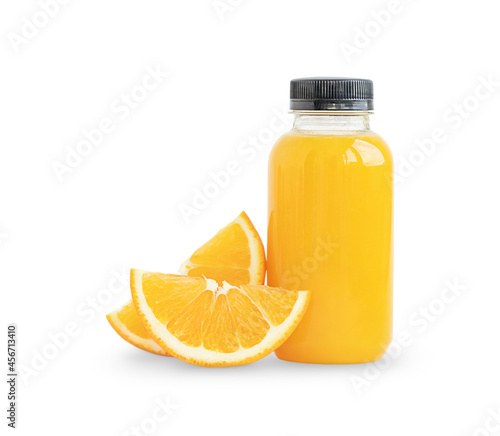 The bottle of orange juice and slices of orange isolated on white background	
