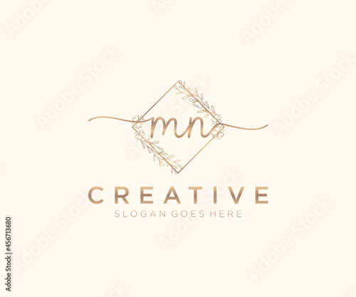 initial MN Feminine logo beauty monogram and elegant logo design, handwriting logo of initial signature, wedding, fashion, floral and botanical with creative template.