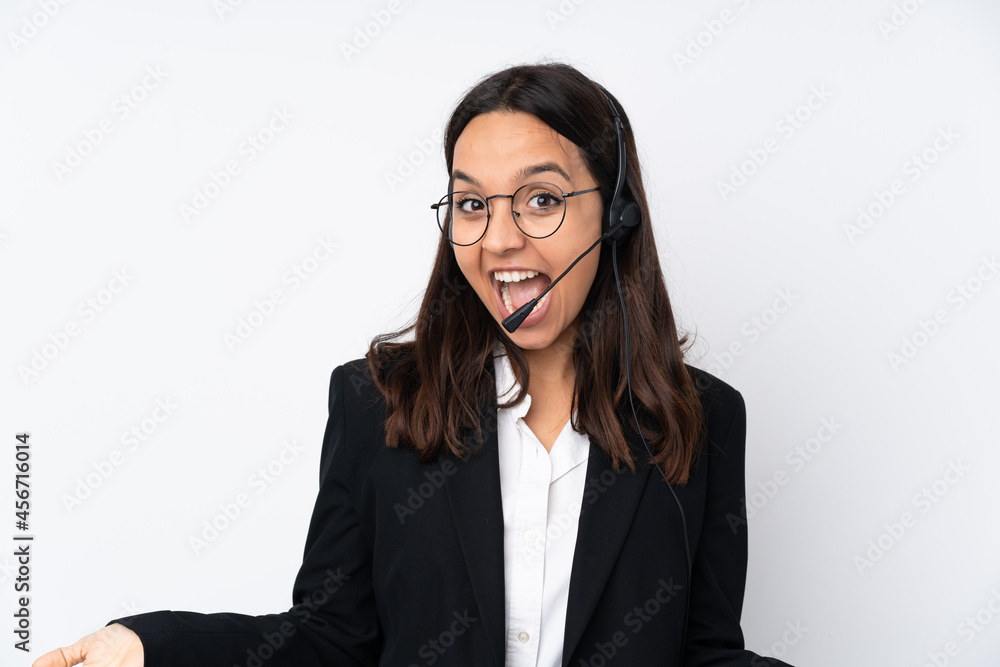 Young telemarketer woman isolated on white background smiling Young telemarketer woman isolated on white background smiling