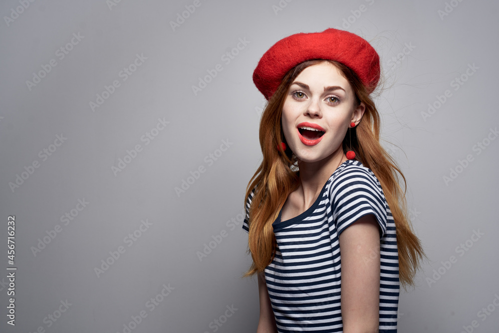 beautiful woman wearing a red hat makeup France Europe fashion posing summer beautiful woman wearing a red hat makeup France Europe fashion posing summer
