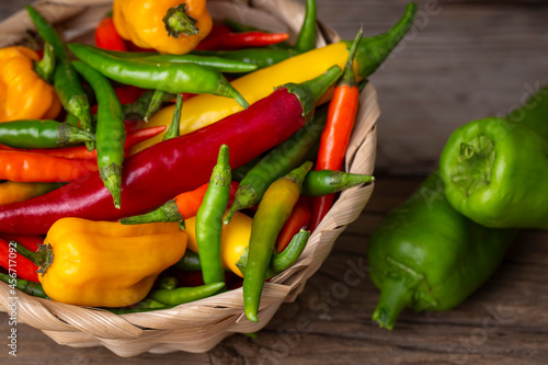 Colorful hot peppers on woo...