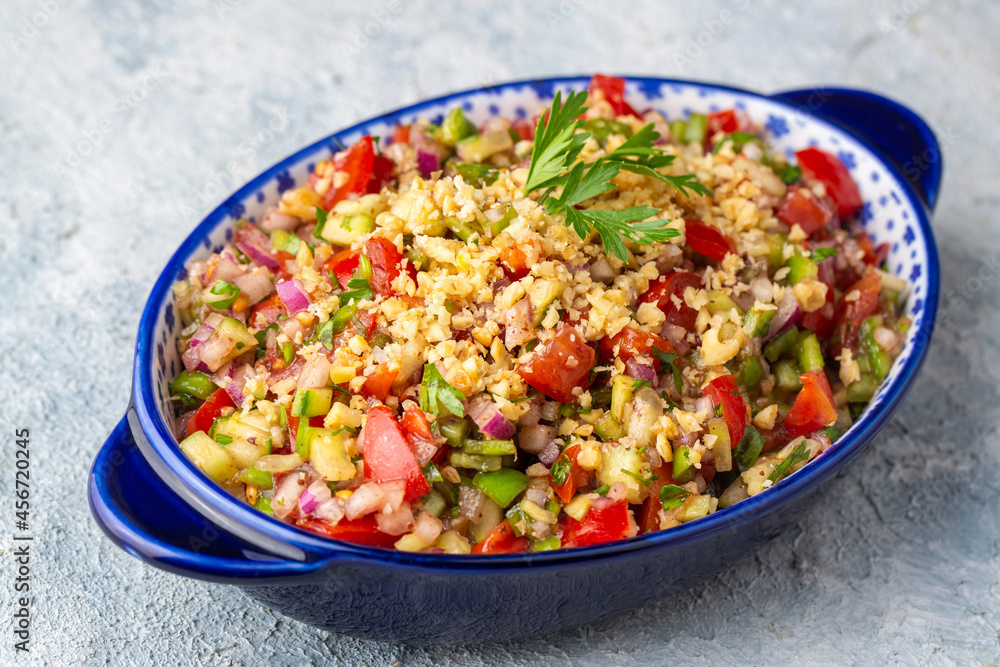 Traditional delicious Turkish cuisine, salad with tomatoes, cucumbers (Turkish name; Gavurdagi salata) Traditional delicious Turkish cuisine, salad with tomatoes, cucumbers (Turkish name; Gavurdagi salata)