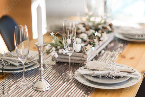 Decorated christmas served table in cozy atmosphere
