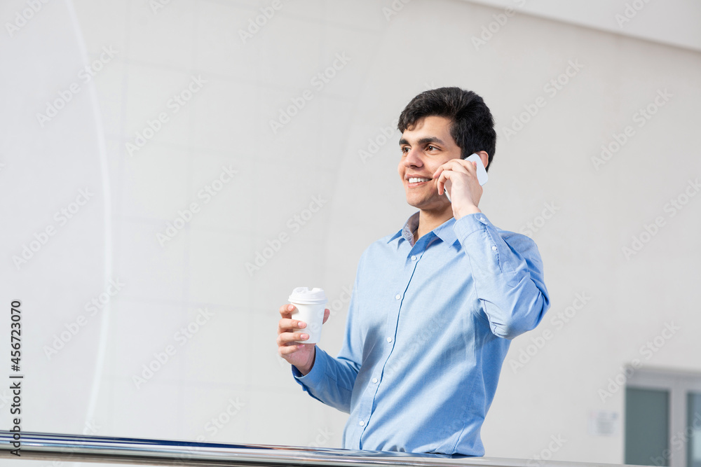young businessman talking on his cell phone